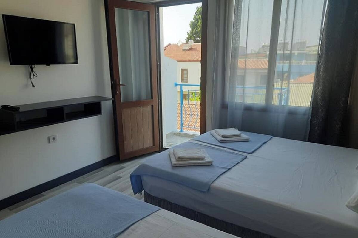 Habitación triple Confort | Ropa de cama de alta calidad, escritorio, sistema de insonorización
