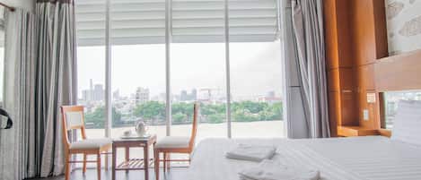 Premium bedding, desk, blackout curtains, soundproofing