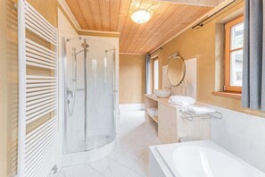 Shower, hair dryer, towels, soap