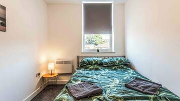 1 Schlafzimmer, BĂŒgeleisen/BĂŒgelbrett, kostenloses WLAN, BettwĂ€sche