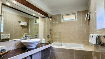 Hair dryer, towels, soap, shampoo