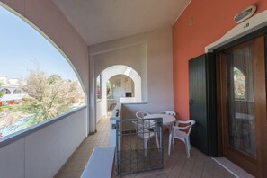 Apartment, 1 Bedroom, Balcony, Garden View | Balcony - Modern Apartment With Terrace and Fireplace (San Michele al Tagliamento)
