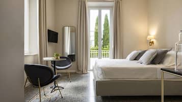 Premium bedding, down comforters, minibar, in-room safe