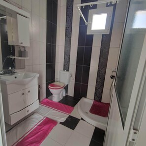 Shower, towels, soap, shampoo