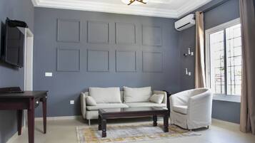 32-inch flat-screen TV with digital channels