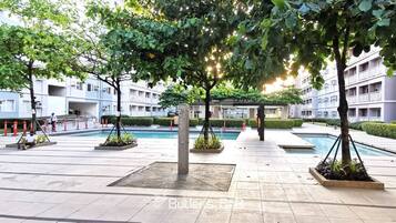Room, 1 Bedroom, Accessible, Pool View | Property grounds