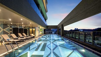 Outdoor pool, open 7:00 AM to 9:00 PM, pool umbrellas, sun loungers