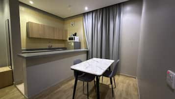Suite | Cuisine privée | Mini réfrigérateur, micro-ondes, îlots de cuisine