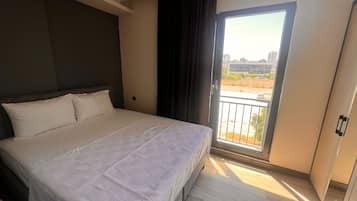 Deluxe-lejlighed | Premium-sengetøj, skrivebord, lydisolering, strygejern/strygebræt