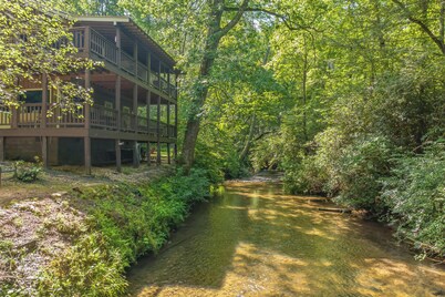 Private retreat at the waters edge of one of NE Ga premier trout streams.