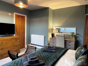 1 habitación, tabla de planchar con plancha, wifi y ropa de cama 