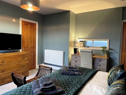 Mew Stone - A large double room with extensive views out to sea.