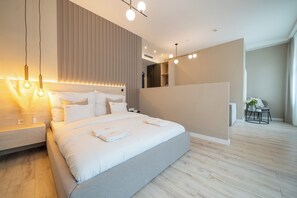 Familiekamer, balkon | Een minibar, gratis wifi, beddengoed