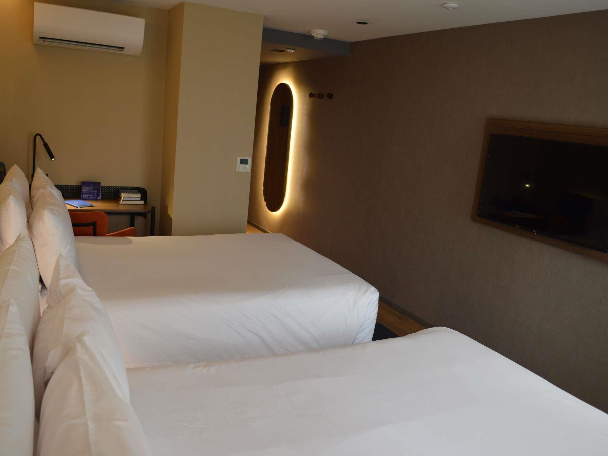 Superior Room, 2 Double Beds | In-room safe, laptop workspace, blackout drapes, iron/ironing board