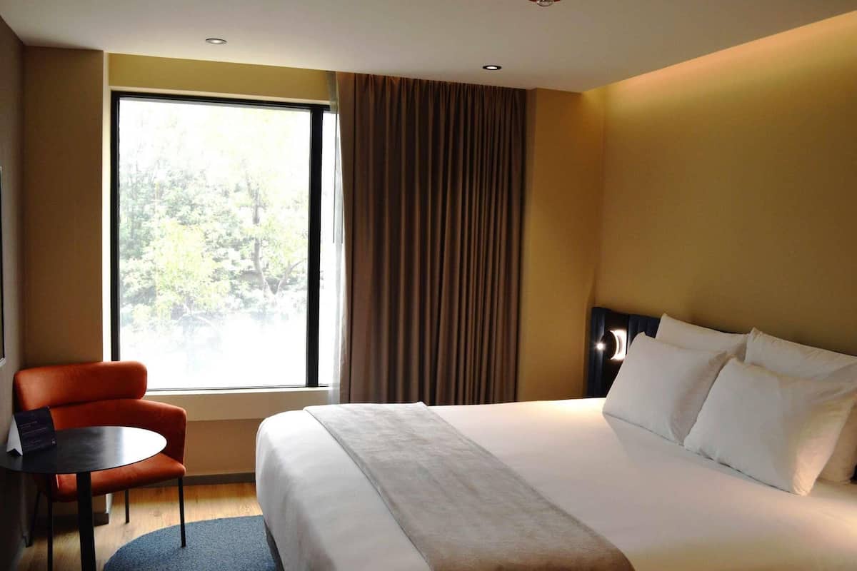 Superior Room, 1 King Bed | In-room safe, laptop workspace, blackout drapes, iron/ironing board