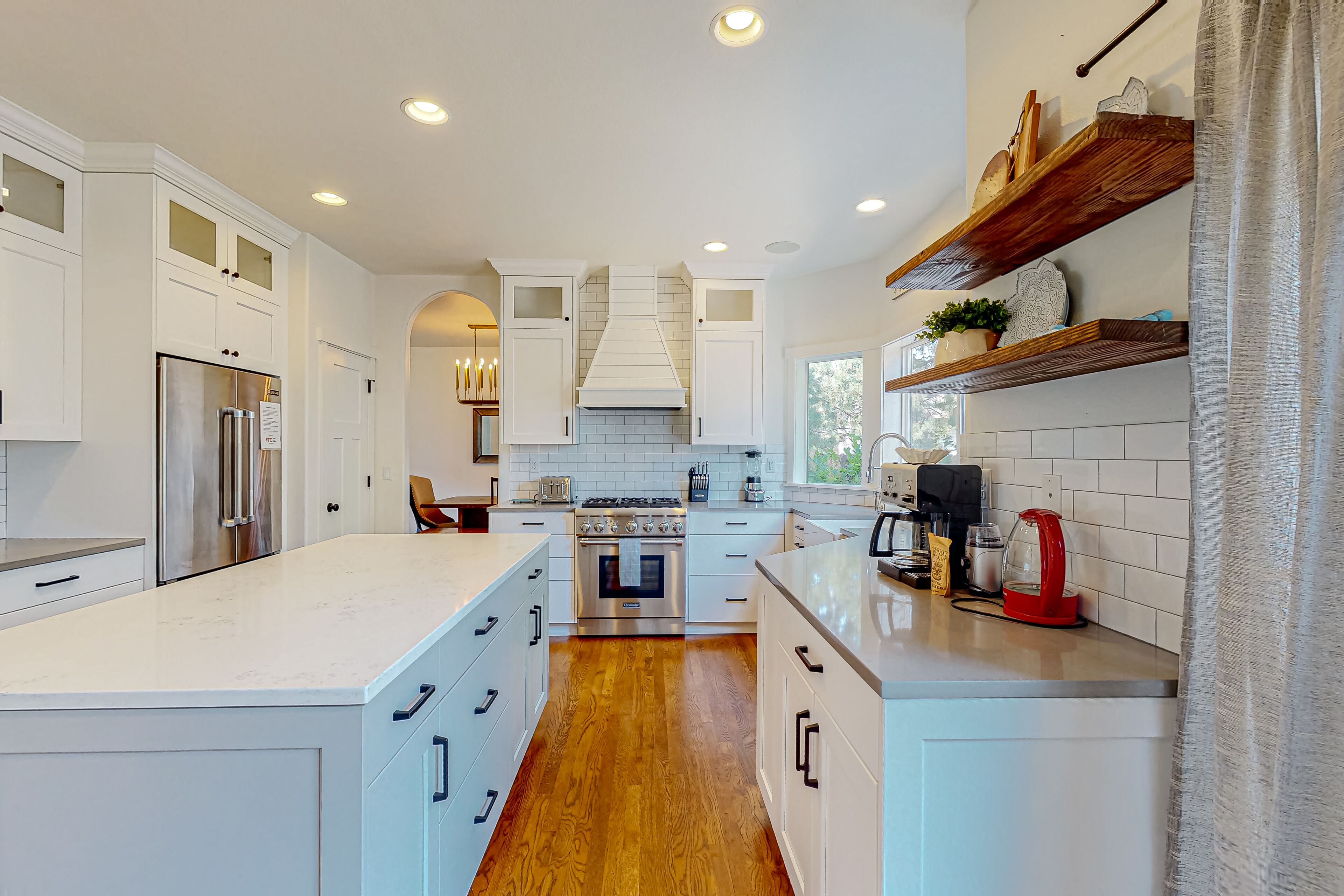 Farmhouse style home with gourmet kitchen and fenced yard