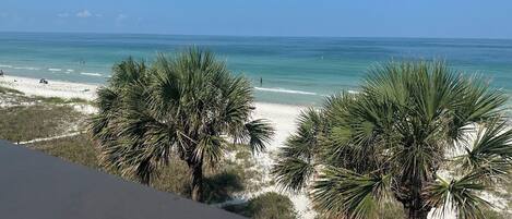 On the beach, sun loungers, beach towels