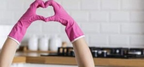 A pair of hands forming a heart shape with pink gloves. - Remodeled Courtyard Apt w/King Bed, In-Unit Washer & Dyer Apt 5 (Albuquerque)