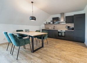 Dining - Modern vacation apartment directly on the Friesensee "Strandbox Nord" (Wittmund)