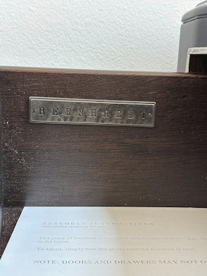A piece of furniture with a metal plaque engraved with the name "BERNARD." - Exquisite 4-bedroom and 4b villa  Irvine eastwood (Irvine)
