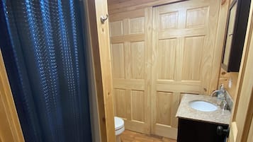 Shower, towels, toilet paper