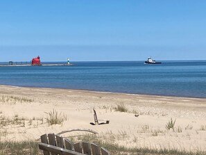 On the beach, sun-loungers, beach towels