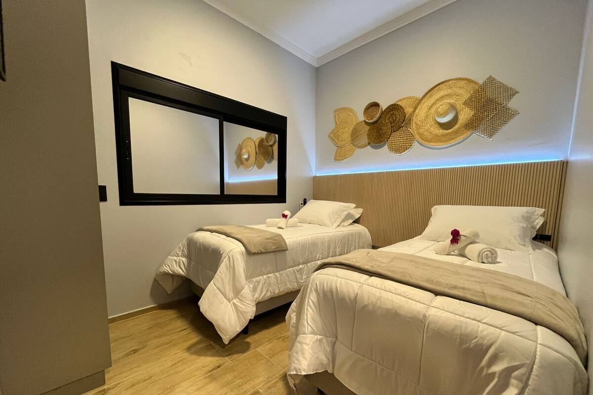 Apartamento | 2 quartos, cortinas blackout, Wi-Fi de cortesia, roupa de cama