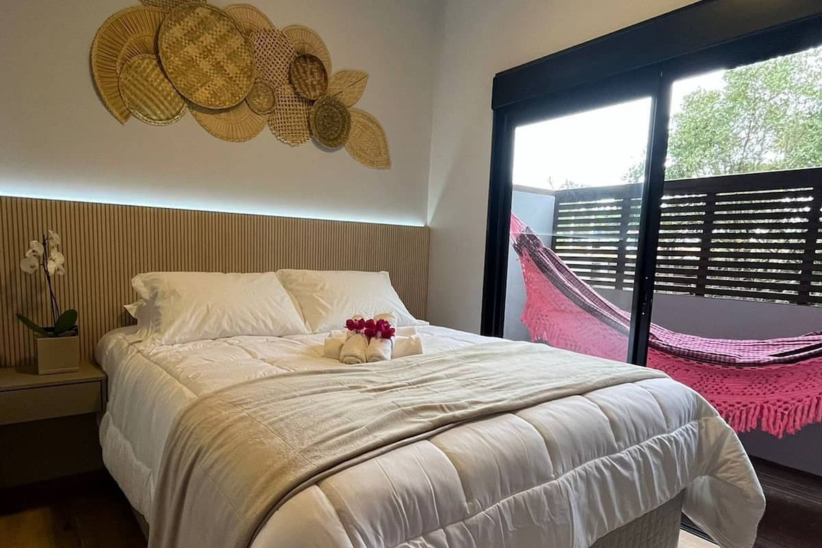 Apartamento | 2 quartos, cortinas blackout, Wi-Fi de cortesia, roupa de cama