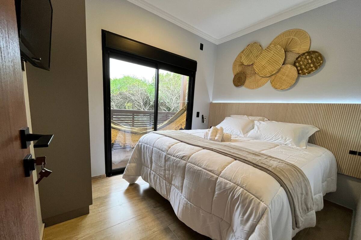 Apartamento | 2 quartos, cortinas blackout, Wi-Fi de cortesia, roupa de cama