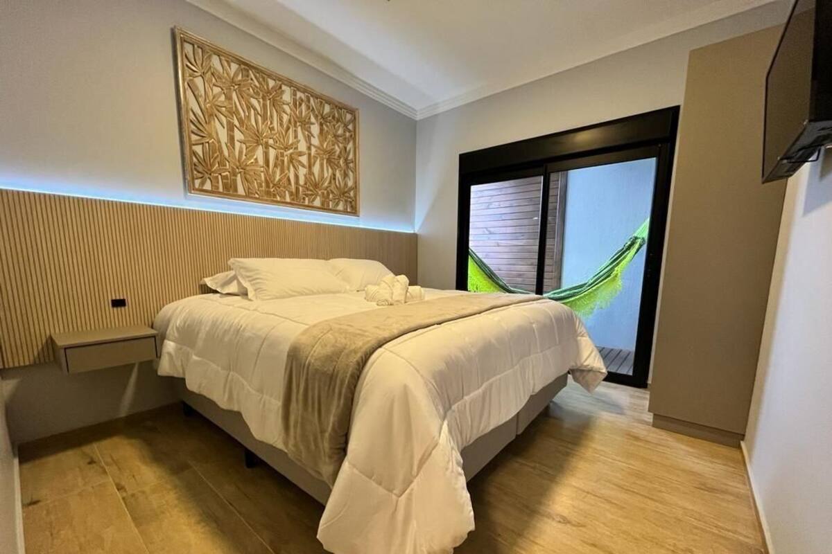 Apartamento | 2 quartos, cortinas blackout, Wi-Fi de cortesia, roupa de cama