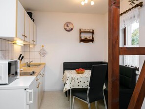 Fridge, microwave, cookware/dishes/utensils