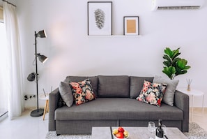 Ferienhaus, 2 Schlafzimmer, Balkon, Gartenblick | Wohnbereich