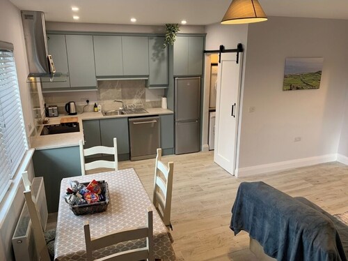 Tadgh's Cottage 
Near the Cliffs and Beaches 