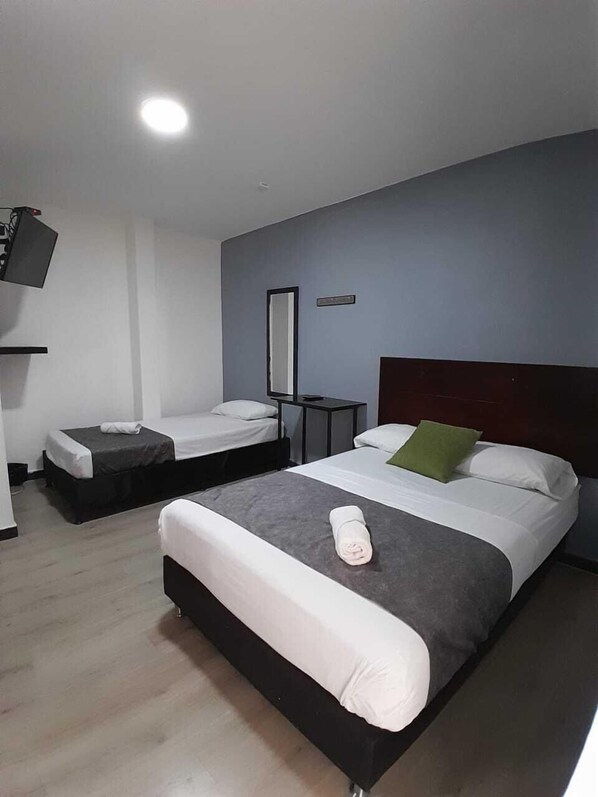 Basic Triple Room | Down comforters, free WiFi, bed sheets - Hotel Palermo Real (Medellín)