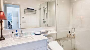 Shower, hair dryer, towels, soap