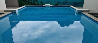 Tipanie- Apt F2 PPT w/pool, A/C, high speed Wifi and wonderful view