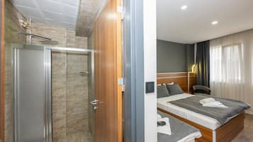 Egyptian cotton sheets, premium bedding, down comforters, minibar