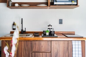 Fridge, microwave, stovetop, coffee/tea maker