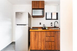 Fridge, microwave, stovetop, coffee/tea maker
