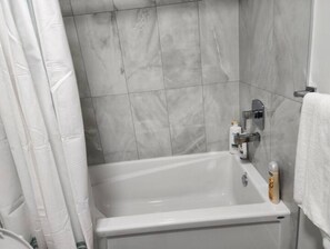 Hair dryer, towels, soap, shampoo