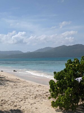 On the beach, sun-loungers, beach towels