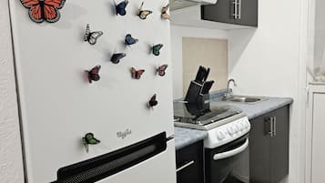 Refrigerador, microondas, horno, placa de cocina