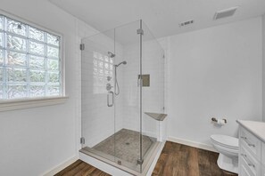 Combined shower/tub, hair dryer, towels, soap