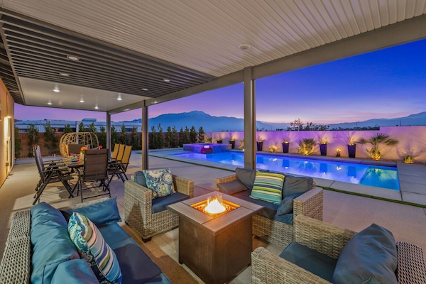 Relax in our lounge seating area with fire pit and beautiful sunset views.