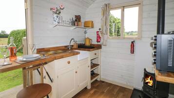 Fridge, electric kettle, toaster, cookware/dishes/utensils