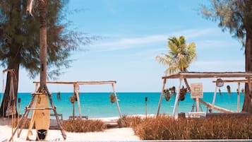 On the beach, white sand, 2 beach bars