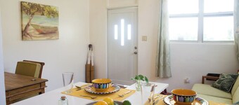 ELM's is nestled in Cane Garden Bay right on the sandy beachfront.