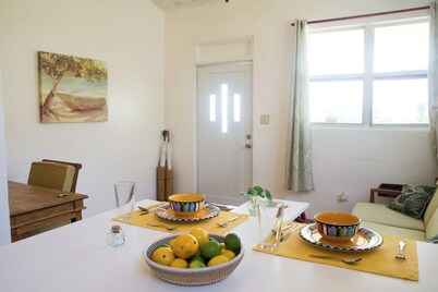 ELM's is nestled in Cane Garden Bay right on the sandy beachfront.