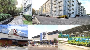 A multi-story residential building with balconies, a parking lot, a commercial building with a sign, a shopping area, and a covered outdoor space.