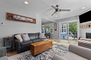 Smart TV, fireplace, books